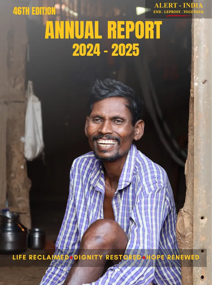 ALERT INDIA Annual Report 2024–2025, 46th edition: a smiling man in a striped shirt sits in a doorway, “Life reclaimed, dignity restored, hope renewed”